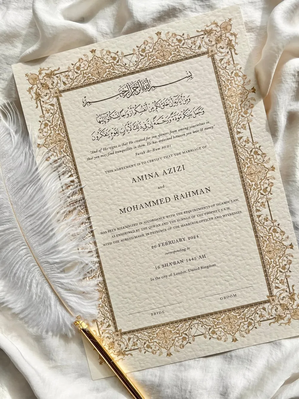 A gilded invitation with an ornate border